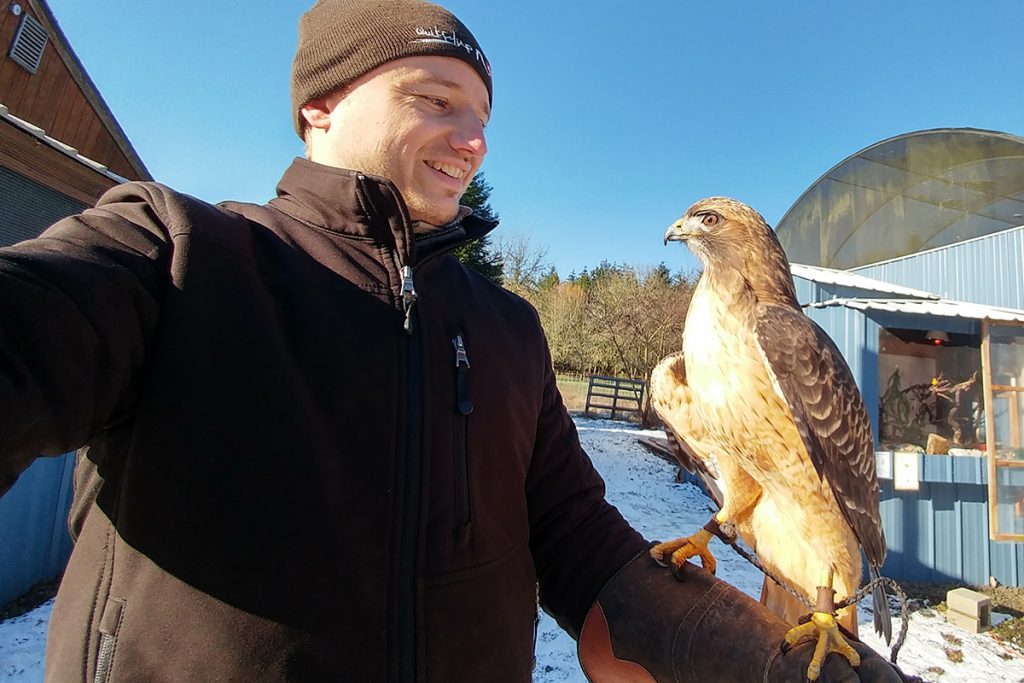 Jon holding Red Tail Hawk